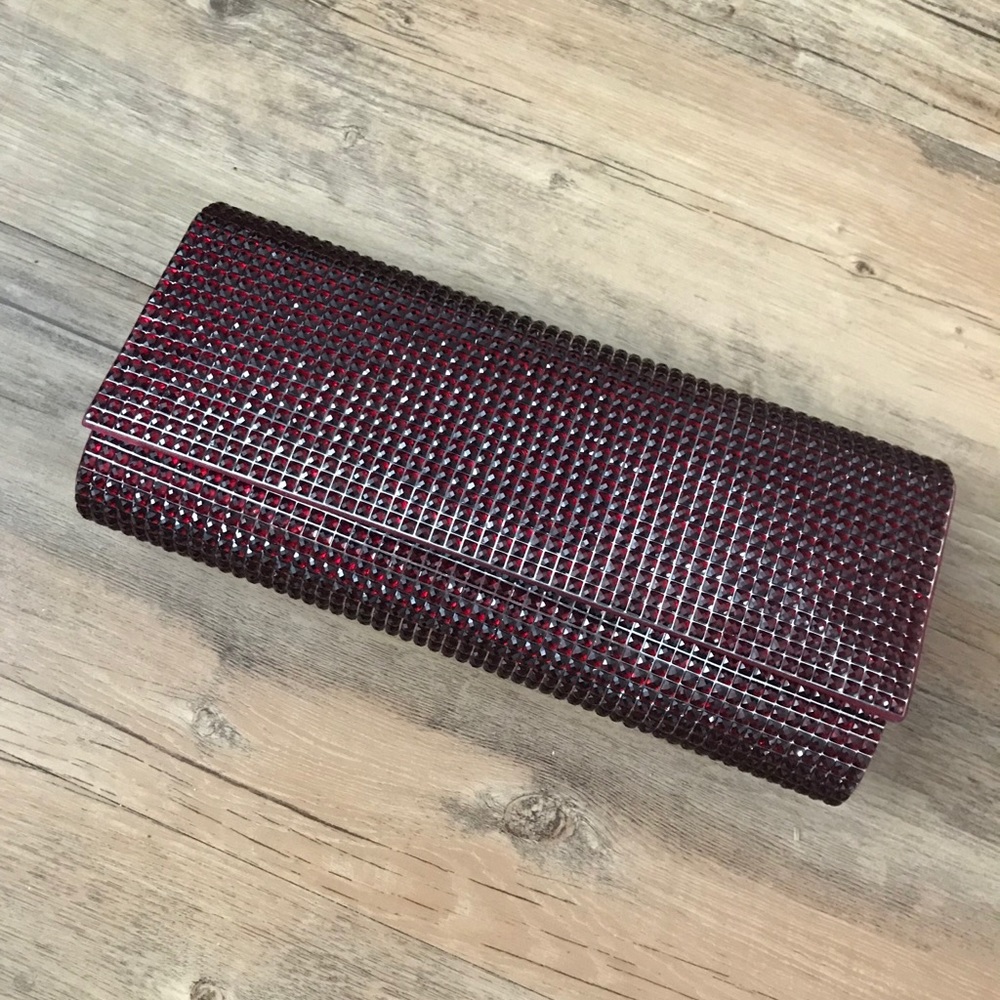 Red studded clutch